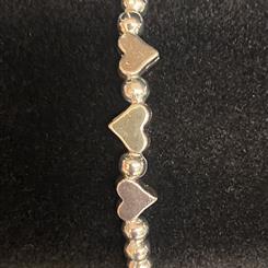 Silver plated triple heart bracelet